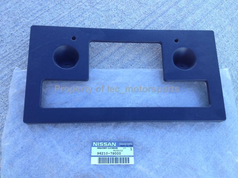 New genuine oem 2004-2012 nissan titan front license plate bracket 96210-7s000