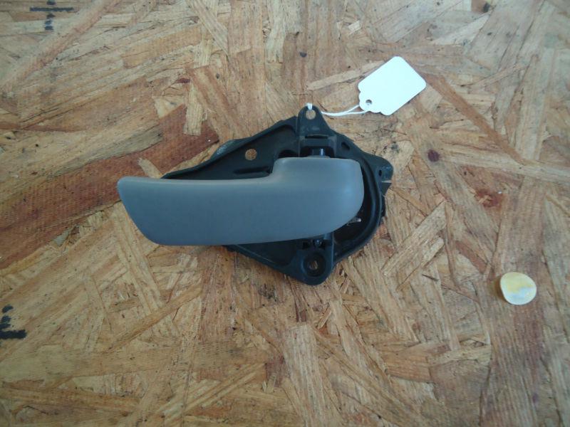 Passenger right side interior door handle assembly gray caravan 96-2000 05023