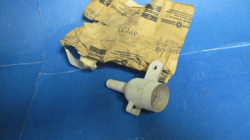 Mopar illuminated door entry housing n.o.s.80-84 mopar models.