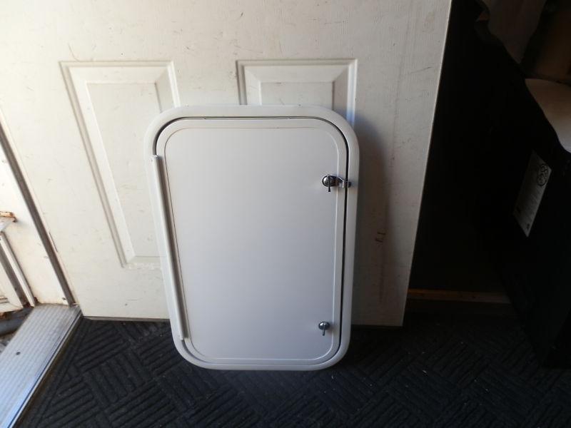 Rv cargo door r.o. 26" tall x 16" wide x 1 1/4" thick ( used )