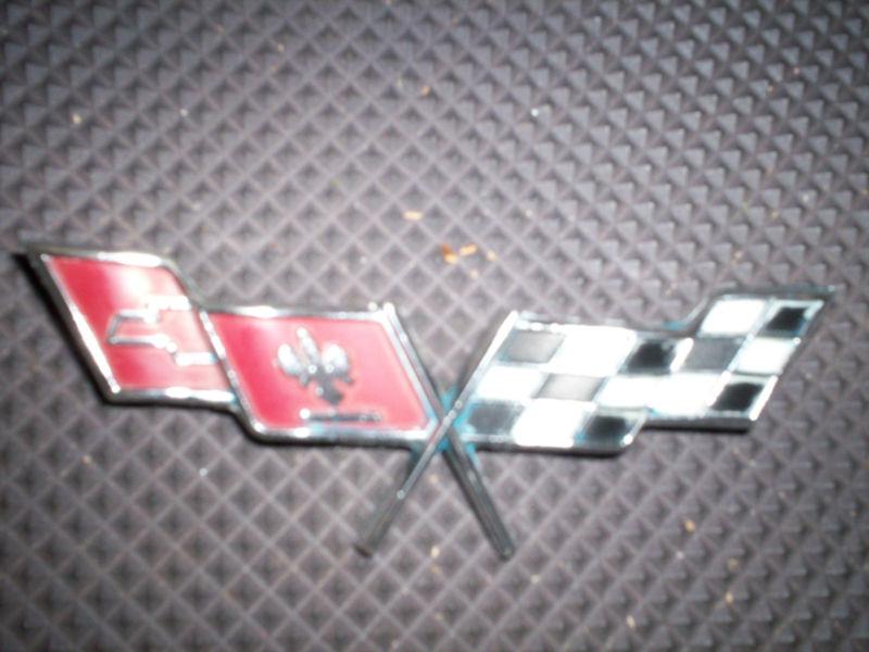 Corvette emblem 1977-1979 used but pretty nice clean back and 2 mounting tabs