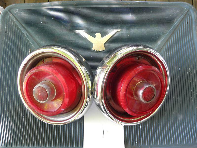 1955 ford thunderbird tail light  assembly -housing, lenses,  - pair 1b