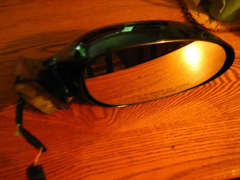 Sell New Passengers Power Side View Mirror Glass and Housing Regal