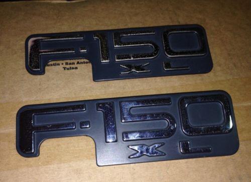 1997,98,99,00,01,02,03 ford f150 fender emblem used oem 2 emblems