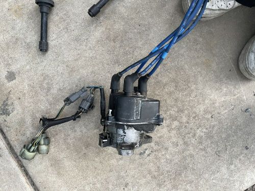 1996-2001 acura integra ignition distributor with spark plug wires.