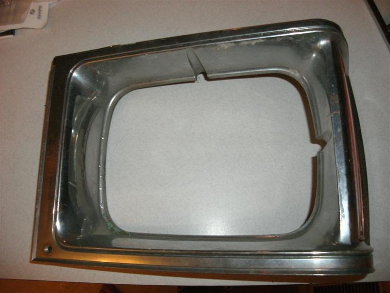 Sell 1980 Volare Aspen left driver side headlight grille bezel with