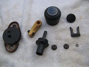 Toyota parts lot grab bag 1970's shift knob, firewall grommet, end connector etc