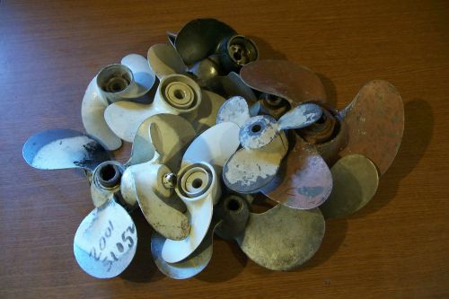 Outboard propellers new and used...chrysler, johnson, scott, etc as pictured