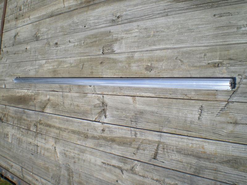 Tarp axle for dump trailer tarp 