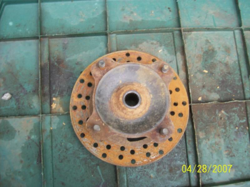 1997 kawasaki prairie 400 4wd front hub with rotor