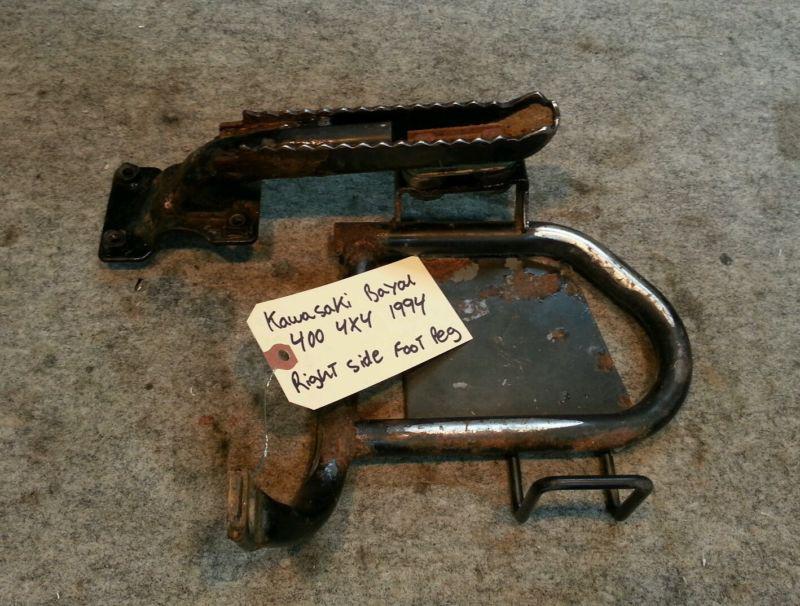 Kawasaki bayou 300- 400 4x4  1994 right side foot peg 