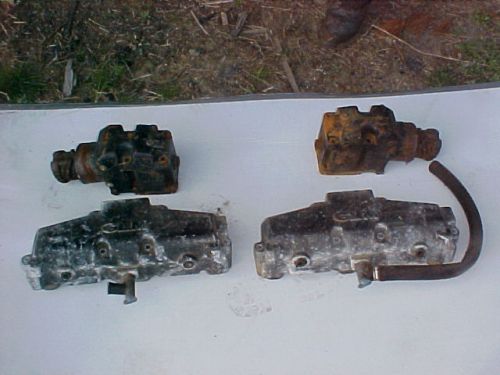 Set of ( 2 ) exhaust manifolds with risers for a chevy 350 ( v8 ) inboard motor.