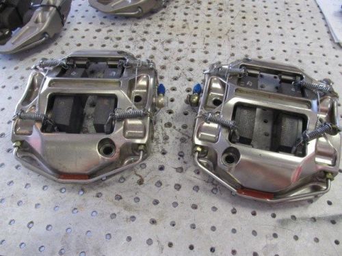 Nascar pfc 4 piston front calipers with pads return springs and lug nut guard
