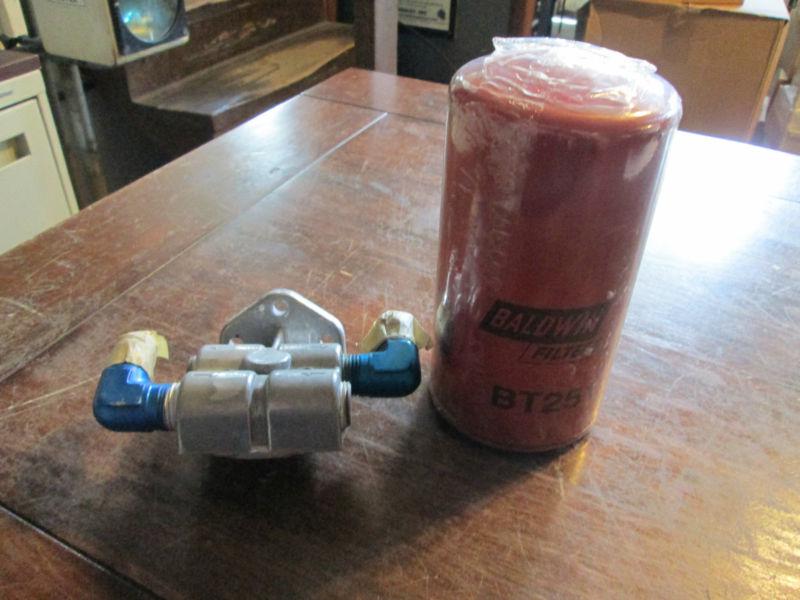 Remote oil filter adaptor with filter