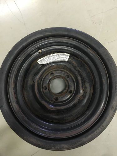 Vintage spare tire space saver