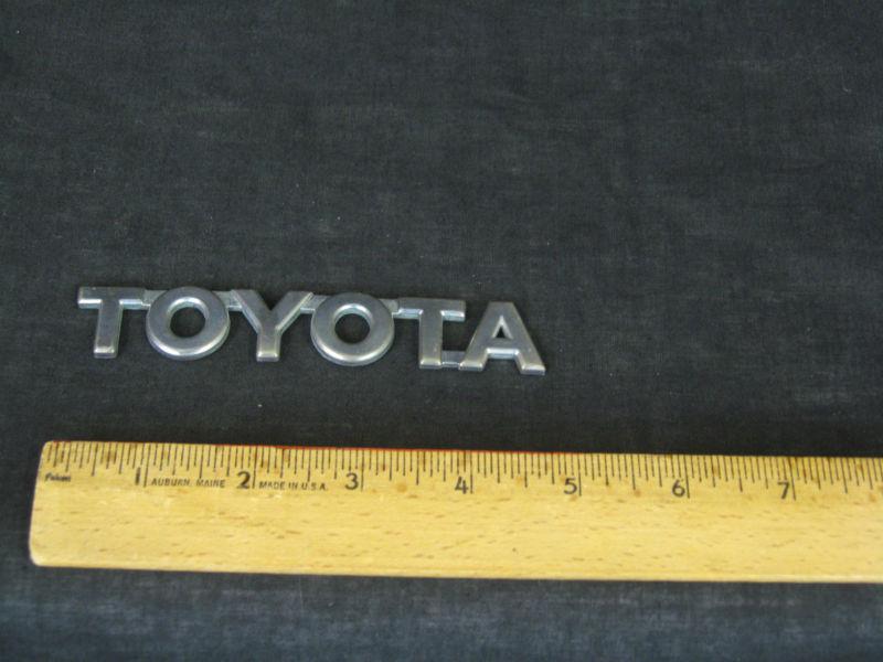 Genuine toyota emblem name plate oem