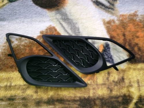 Subaru fog lamp blanks  -  right &amp; left sides  part # 57731ca000 &amp;  57731ca010