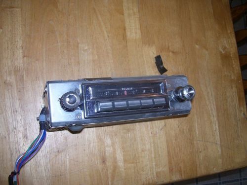 1957 pontiac star chief standard delco radio #7269719/ chrome knobs &amp; bezel