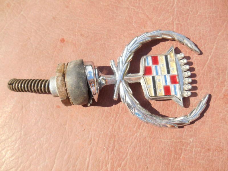 Vintage cadillac 50264 hood ornament w base and nut.  nice driver quality