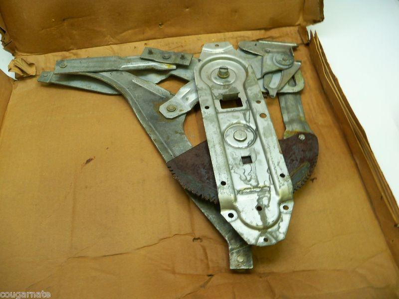 Nos 73 ford galaxie drivers front door power window regulator 