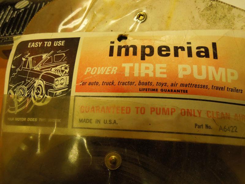 Vintage imperial, spark plug, power tire pump
