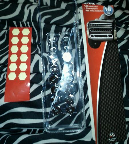 Lot of 12 new in opened package chrome plated spike decals