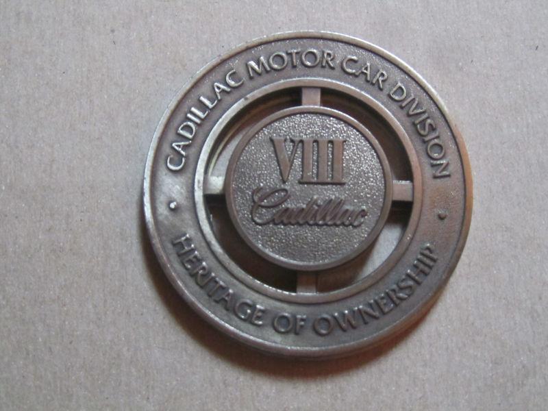 Cadillac grill emblem heritage of ownership  viii