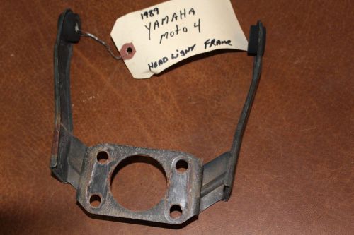 89 yamaha moto 4 yfm-100 head light frame ,used.