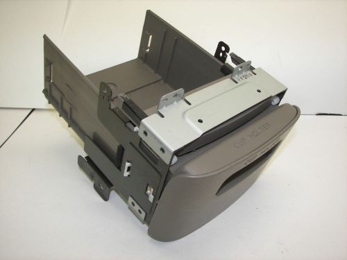 2000-2001  infiniti i30 console cup glass drink holder for the rear int beige