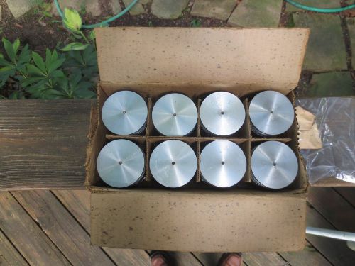 Eight (8) new ford 3 ring flat head pistons standard size with box