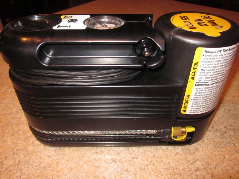 Cadillac cts oem tire emergency compressor inflator used 