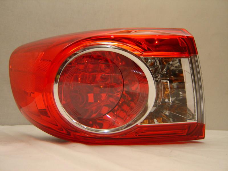 Toyota corolla left tail light 11 12 oem