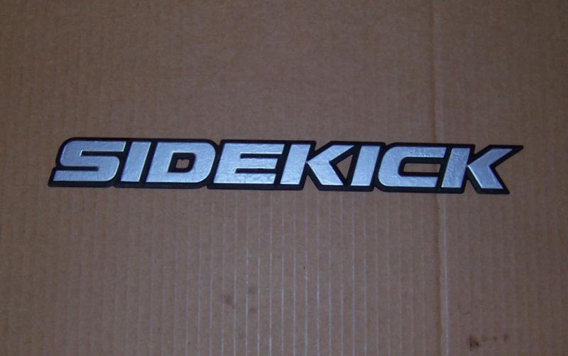 89-98 suzuki sidekick 1pc door nameplate emblems script badge oem 90 92 94 96 95