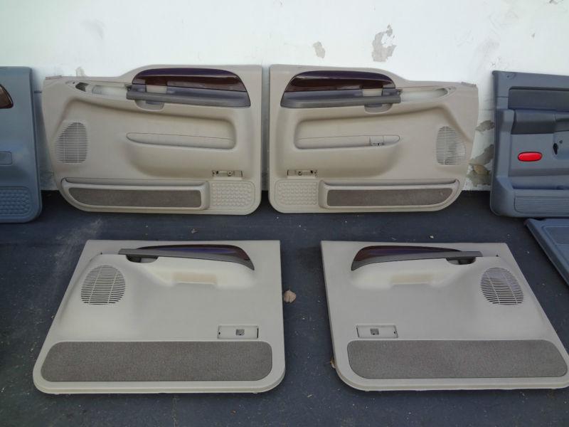 2000-2005 ford excursion front & rear door panels tan with wood grain
