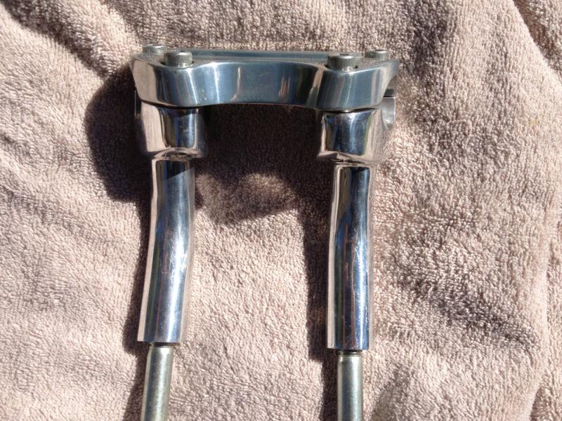 Harley-davidson 4" pullback risers. fits many years. standard spacing.for 1" bar