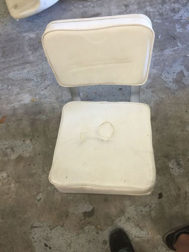 Captain chair with white cushion, metal frame