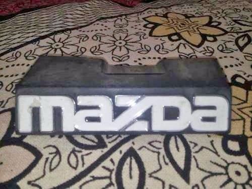 Mazda 323 genunine original front logo emblem