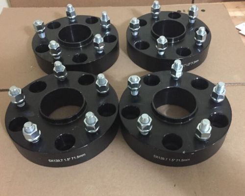 4-   5x5.5 or 5x139.7  hubcentric 71.5mm center bore  1.5&#034; black wheel spacers