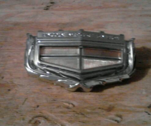 Mercury comet hood emblem