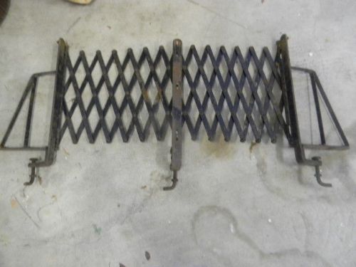 Antique automobile running board luggage rack
