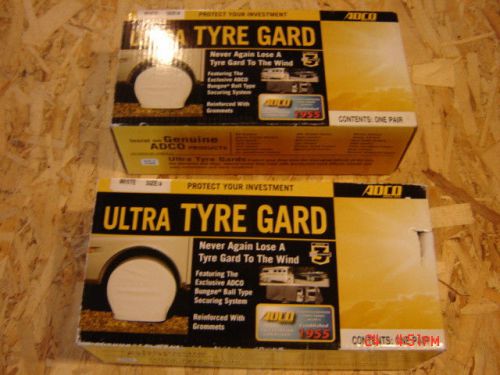 4 - adco rv/camper/trailer-size 4 white vinyl wheel/tire covers 2 pr 24"-26"