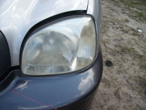 Driver left headlight from 7/14/03 fits 04-06 santa fe 274613