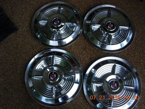 1956 mercury spinner hubcaps