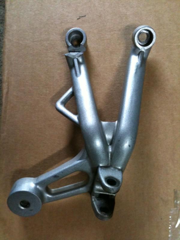 Buy Triumph rear right passenger foot peg bracket in West Roxbury, Massachusetts, US, for US 5.00