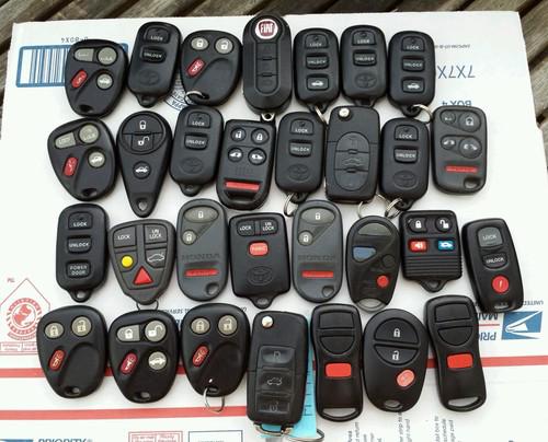 Lot of 30 assorted factory remote keyless entry fob