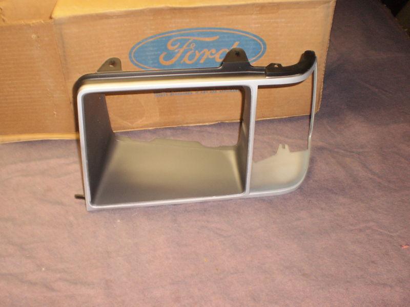 Ford 81,83 escort argent head lamp door lh orig. ford nos