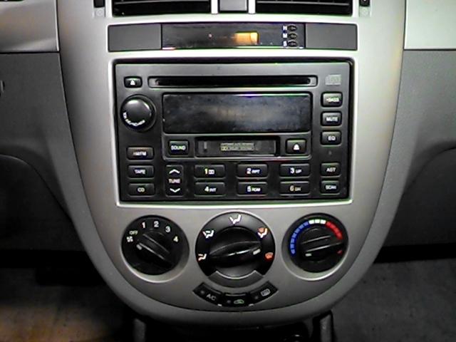 2006 suzuki forenza radio trim dash bezel 2622457