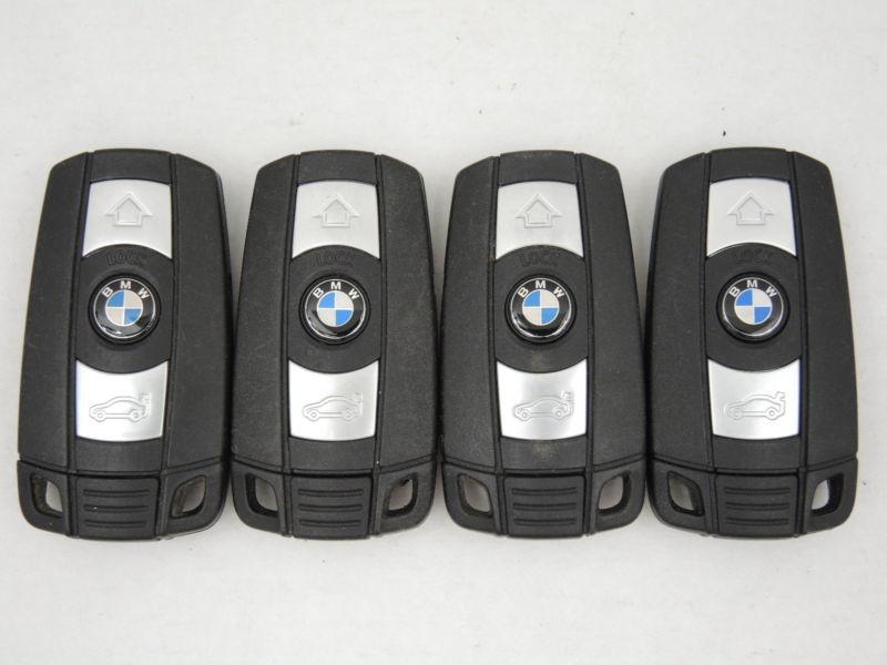 Bmw lot of 4 remotes keyless entry remote fcc id:kr55wk49147