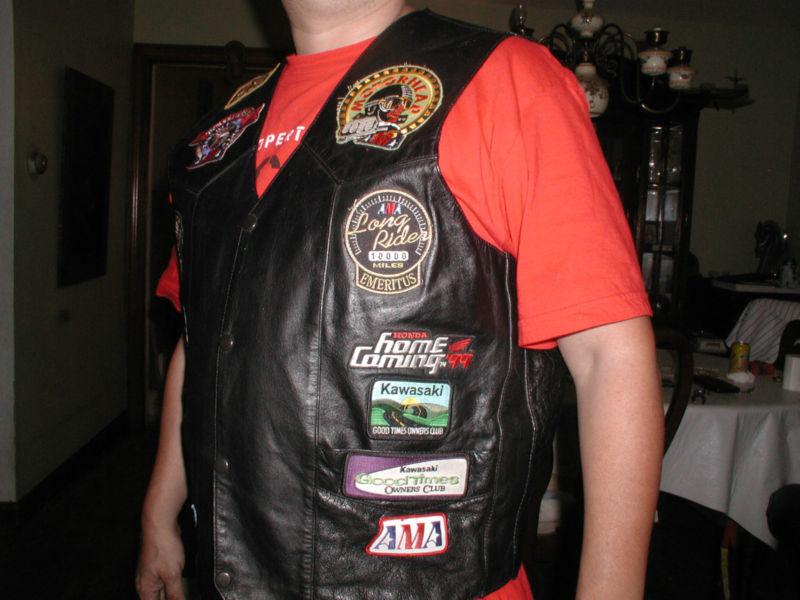 100% genuine  leather motorcycle vest with 13 patches nice xxl!!