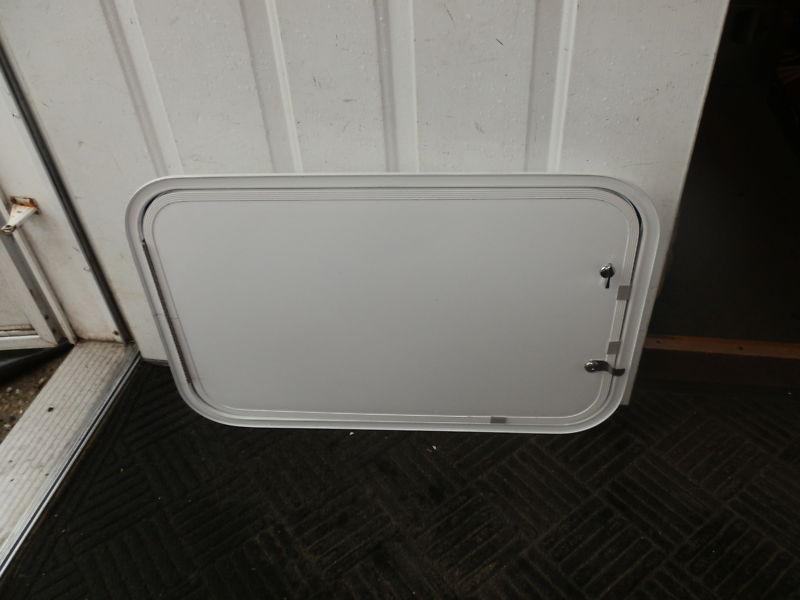 Find RV CARGO DOOR R.O. 28" TALL X 18" WIDE X 3/4" THICK in Bronson